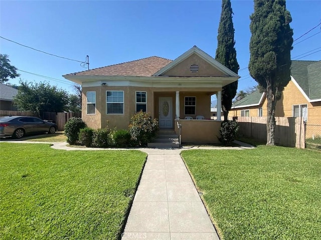 170 W 11th St, San Bernardino, CA 92410 - bungalow featuring stucco siding, a shingled roof, and covered porch