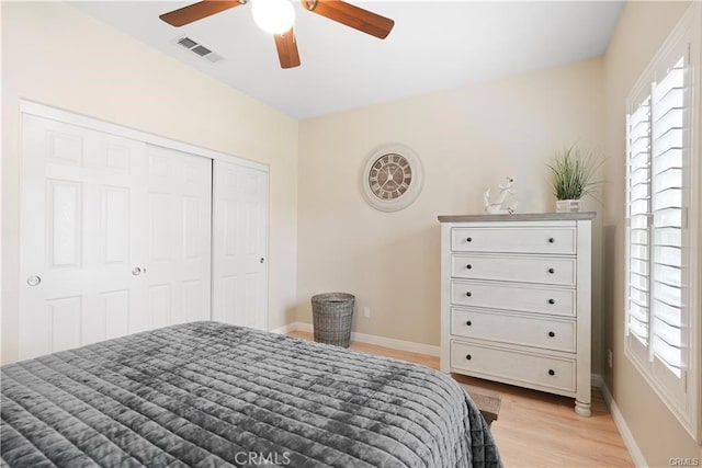 29851 Fox Creek Dr, Menifee, CA 92586 - bedroom featuring light wood-style floors, a closet, and ceiling fan