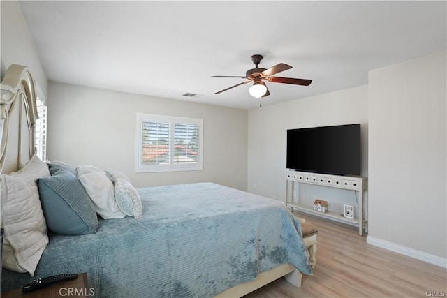 29851 Fox Creek Dr, Menifee, CA 92586 - bedroom featuring wood finished floors and a ceiling fan