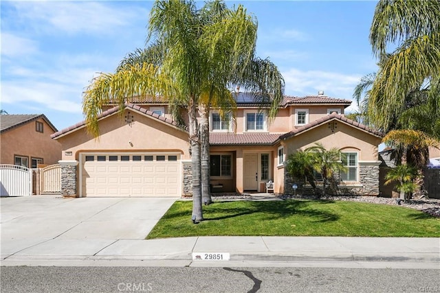 29851 Fox Creek Dr, Menifee, CA 92586 - mediterranean / spanish house featuring a gate, stucco siding, a tiled roof, solar panels, and concrete driveway