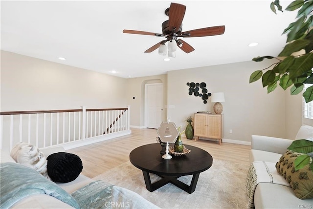 29851 Fox Creek Dr, Menifee, CA 92586 - living area with light wood-type flooring, arched walkways, a ceiling fan, and recessed lighting