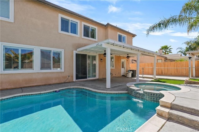 29851 Fox Creek Dr, Menifee, CA 92586 - view of swimming pool featuring a patio area, a ceiling fan, and a pool with connected hot tub