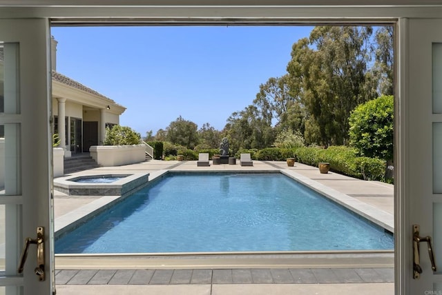 17124 Circa Oriente, Rancho Santa Fe, CA 92067 - view of swimming pool featuring a patio area and a pool with connected hot tub