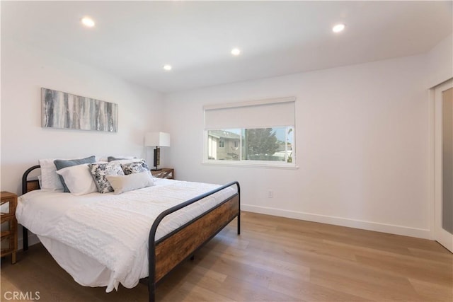 16509 Caballero Ln Unit 30B, Huntington Beach, CA 92649 - bedroom with light wood-type flooring and recessed lighting