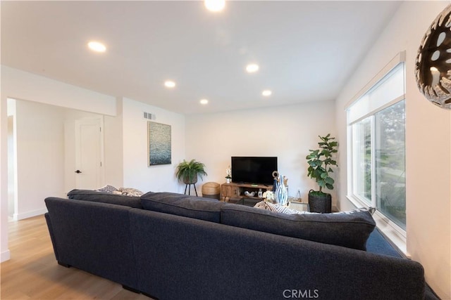 16509 Caballero Ln Unit 30B, Huntington Beach, CA 92649 - living room with light wood-style floors and recessed lighting
