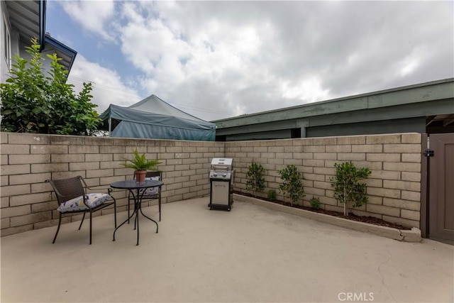 16509 Caballero Ln Unit 30B, Huntington Beach, CA 92649 - fenced backyard featuring a patio and area for grilling