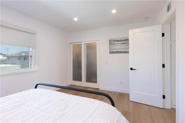 16509 Caballero Ln Unit 30B, Huntington Beach, CA 92649 - bedroom with wood finished floors and recessed lighting