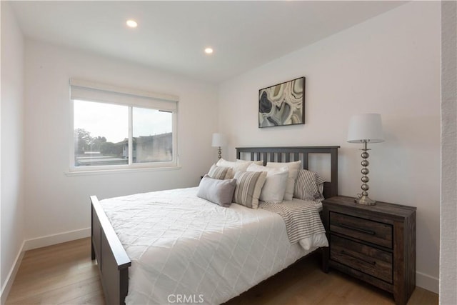 16509 Caballero Ln Unit 30B, Huntington Beach, CA 92649 - bedroom with light wood-type flooring and recessed lighting
