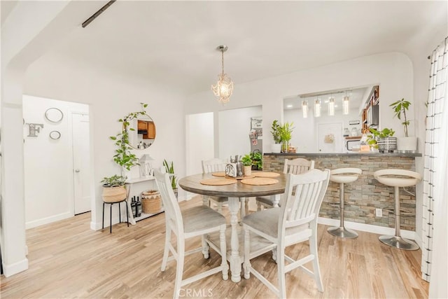 764 W 107th St, Los Angeles, CA 90044 - dining area with wood finished floors and baseboards