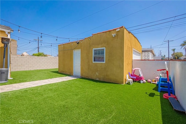 764 W 107th St, Los Angeles, CA 90044 - view of outbuilding with a fenced backyard