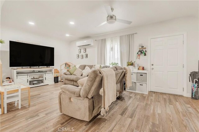 764 W 107th St, Los Angeles, CA 90044 - living area featuring a wall mounted AC, light wood-style flooring, a ceiling fan, and recessed lighting