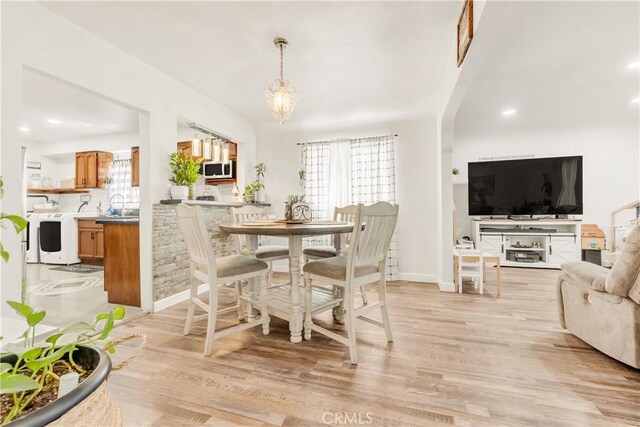 764 W 107th St, Los Angeles, CA 90044 - dining room featuring light wood-style floors, a chandelier, and recessed lighting
