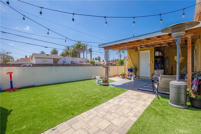 764 W 107th St, Los Angeles, CA 90044 - view of yard with a patio