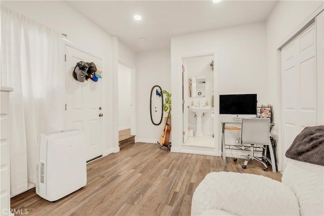 764 W 107th St, Los Angeles, CA 90044 - foyer with wood finished floors and recessed lighting