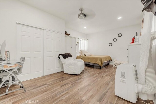 764 W 107th St, Los Angeles, CA 90044 - bedroom featuring light wood-style flooring, a closet, recessed lighting, and ceiling fan