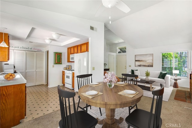 1050 Windmill Ln, Oak Park, CA 91377 - dining room featuring ceiling fan, vaulted ceiling, and light carpet