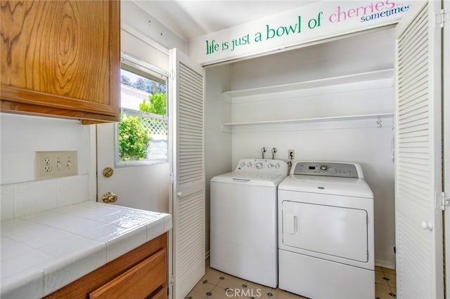 1050 Windmill Ln, Oak Park, CA 91377 - laundry room featuring washer and dryer and cabinet space