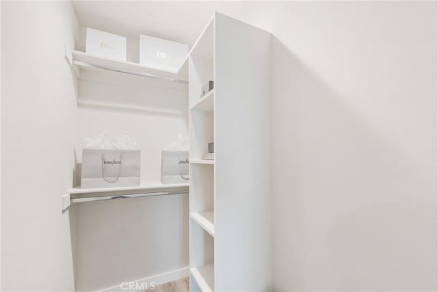 419 N Chandler Ave Unit 523, Monterey Park, CA 91754 - walk in closet featuring wood finished floors