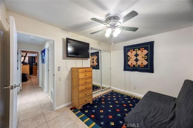 4004 E Horseshoe Ln Unit 54, Anaheim, CA 92807 - living area featuring ceiling fan and light tile patterned flooring