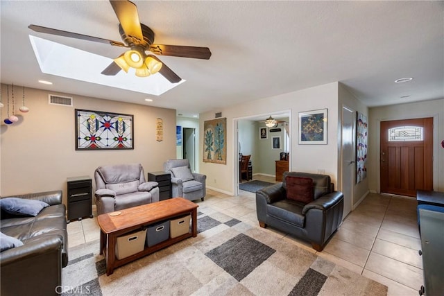 4004 E Horseshoe Ln Unit 54, Anaheim, CA 92807 - living area featuring a skylight, ceiling fan, light tile patterned floors, and recessed lighting