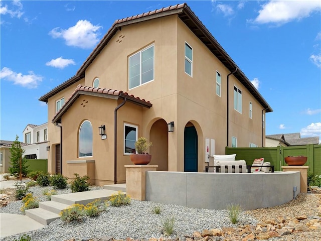 17151 Kent St, Hesperia, CA 92345 - view of front of property with a fenced front yard, stucco siding, and a tiled roof