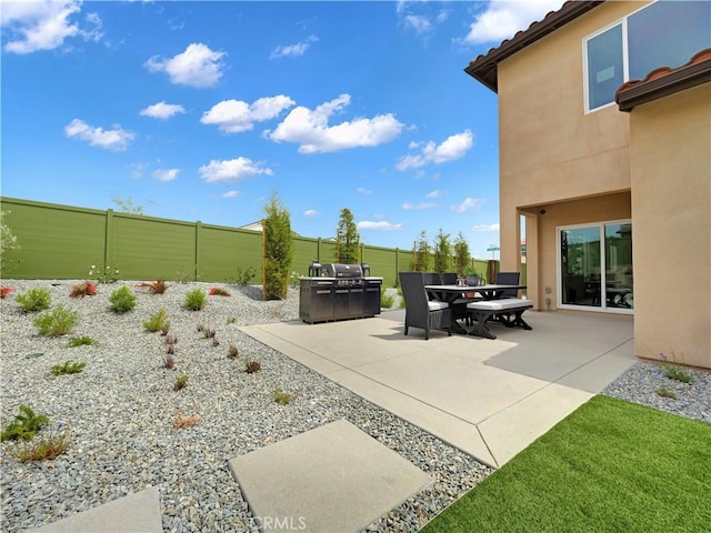 17151 Kent St, Hesperia, CA 92345 - fenced backyard featuring a patio area and outdoor dining area