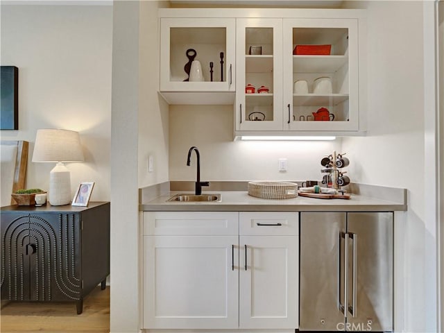 17151 Kent St, Hesperia, CA 92345 - bar featuring high end fridge and light wood-style flooring