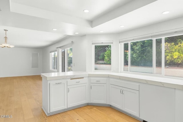 2325 Parkway Dr, Camarillo, CA 93010 - kitchen featuring recessed lighting, light wood-style flooring, white cabinetry, pendant lighting, and a peninsula