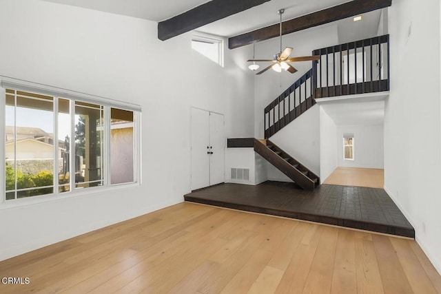 2325 Parkway Dr, Camarillo, CA 93010 - entrance foyer with a high ceiling, plenty of natural light, hardwood / wood-style floors, stairs, and beam ceiling