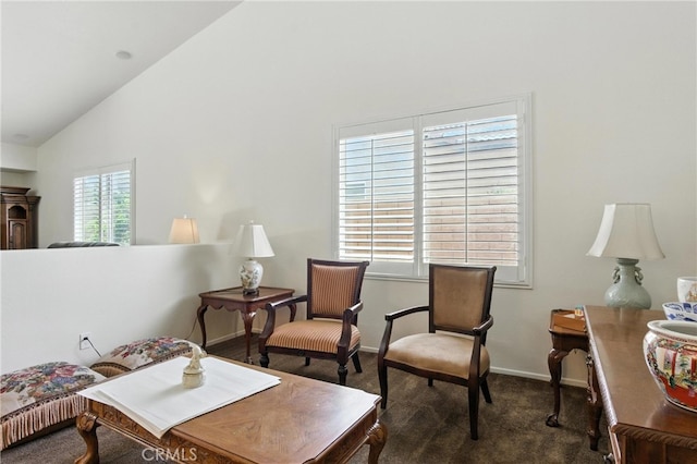 13525 Evanston St, Victorville, CA 92392 - carpeted living area with baseboards and high vaulted ceiling