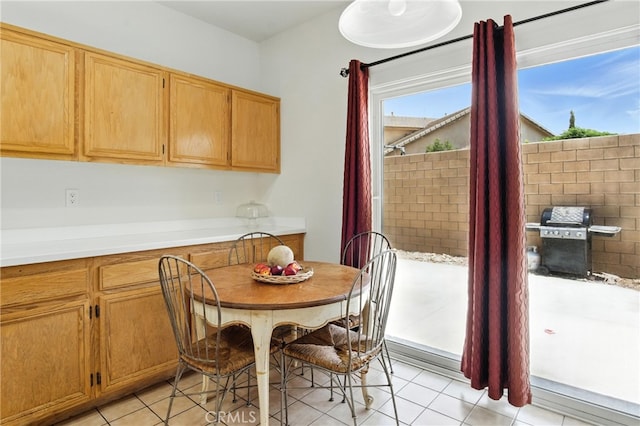 13525 Evanston St, Victorville, CA 92392 - dining area featuring light tile patterned floors