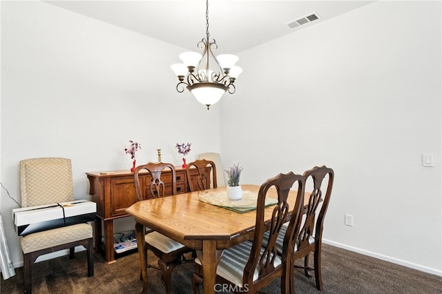 13525 Evanston St, Victorville, CA 92392 - dining space with dark carpet and a chandelier