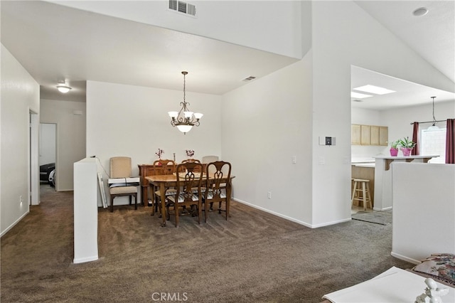 13525 Evanston St, Victorville, CA 92392 - dining room featuring dark colored carpet and a chandelier