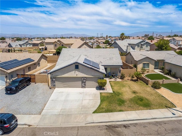 13525 Evanston St, Victorville, CA 92392 - aerial perspective of suburban area featuring a mountainous background