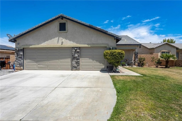 13525 Evanston St, Victorville, CA 92392 - ranch-style home with concrete driveway, an attached garage, stucco siding, stone siding, and a tiled roof