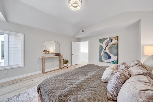 39 Cape Cod, Irvine, CA 92620 - bedroom featuring vaulted ceiling and wood finished floors