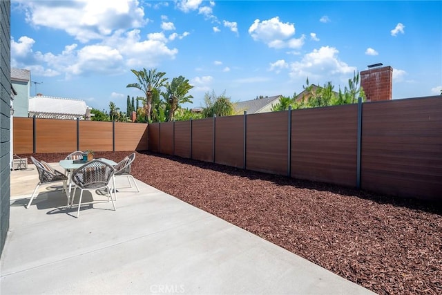 39 Cape Cod, Irvine, CA 92620 - fenced backyard featuring a patio area and outdoor dining area