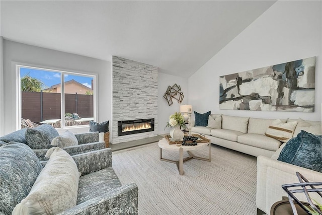 39 Cape Cod, Irvine, CA 92620 - living area featuring a stone fireplace, lofted ceiling, and wood finished floors