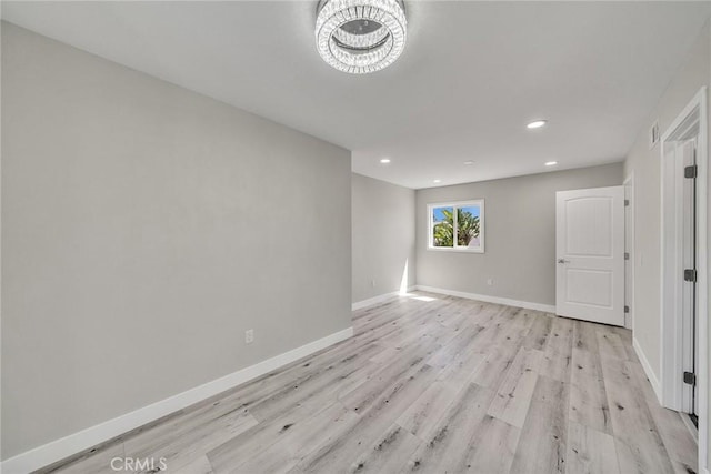 39 Cape Cod, Irvine, CA 92620 - unfurnished room featuring light wood-type flooring, a chandelier, and recessed lighting