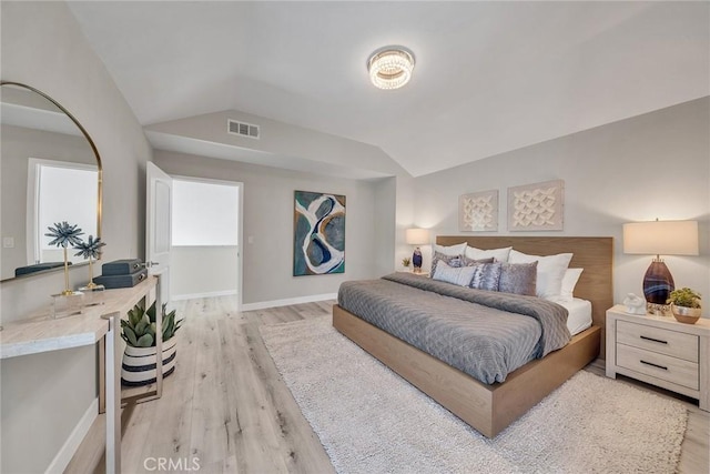 39 Cape Cod, Irvine, CA 92620 - bedroom featuring vaulted ceiling and light wood-style floors