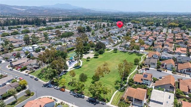 39 Cape Cod, Irvine, CA 92620 - aerial overview of property's location featuring a mountainous background and nearby suburban area