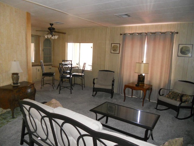 955 Howard Ave Unit 40, Escondido, CA 92029 - living area with carpet, a ceiling fan, and wooden walls