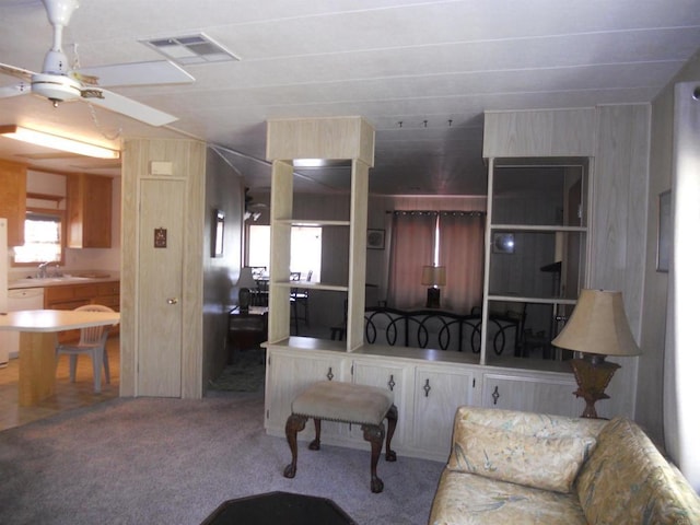 955 Howard Ave Unit 40, Escondido, CA 92029 - carpeted living room featuring ceiling fan and a sink