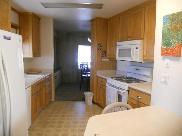 955 Howard Ave Unit 40, Escondido, CA 92029 - kitchen with white appliances, light countertops, and brown cabinets