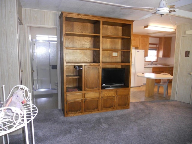 955 Howard Ave Unit 40, Escondido, CA 92029 - living area featuring a ceiling fan and light carpet
