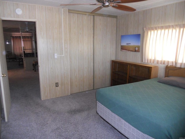 955 Howard Ave Unit 40, Escondido, CA 92029 - bedroom featuring carpet floors, wooden walls, and a closet