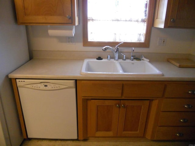 955 Howard Ave Unit 40, Escondido, CA 92029 - kitchen with white dishwasher, brown cabinetry, and light countertops