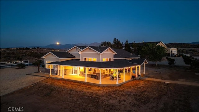 35655 52nd St E, Palmdale, CA 93552 - rear view of property with a patio area and a mountain view