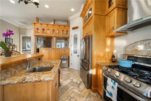 35655 52nd St E, Palmdale, CA 93552 - kitchen featuring stainless steel appliances, crown molding, wall chimney exhaust hood, an island with sink, and stone tile flooring