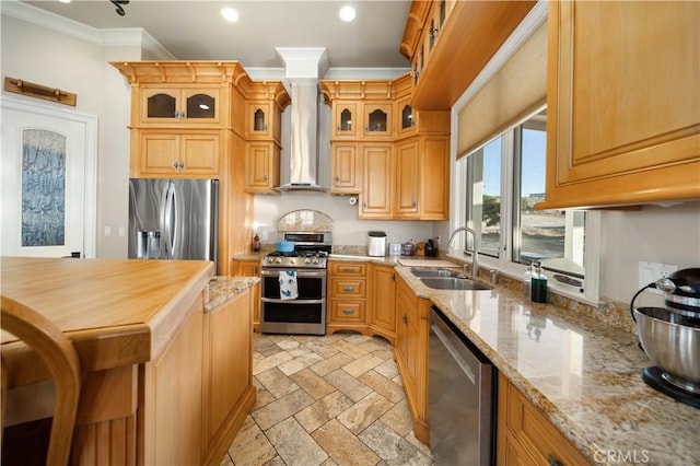 35655 52nd St E, Palmdale, CA 93552 - kitchen featuring appliances with stainless steel finishes, wall chimney range hood, crown molding, recessed lighting, and light stone counters